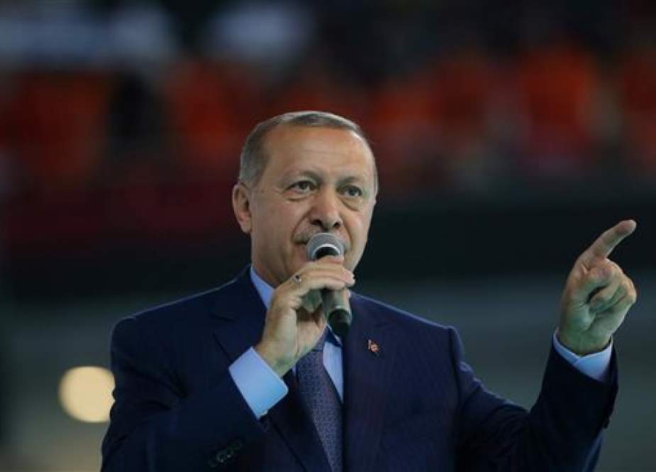 Turkish President Recep Tayyip Erdogan makes a speech during a meeting of his ruling AK Party in Ankara, Turkey, on August 4, 2018. (Photo by Reuters)