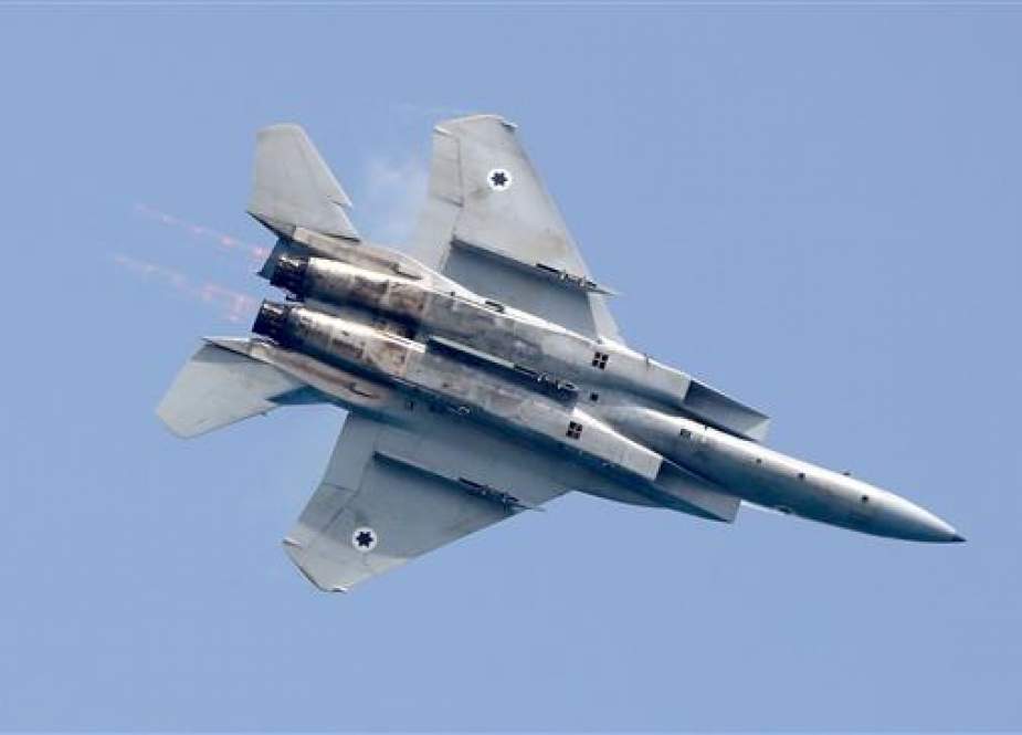 The file photo shows an Israeli F-15 jet.