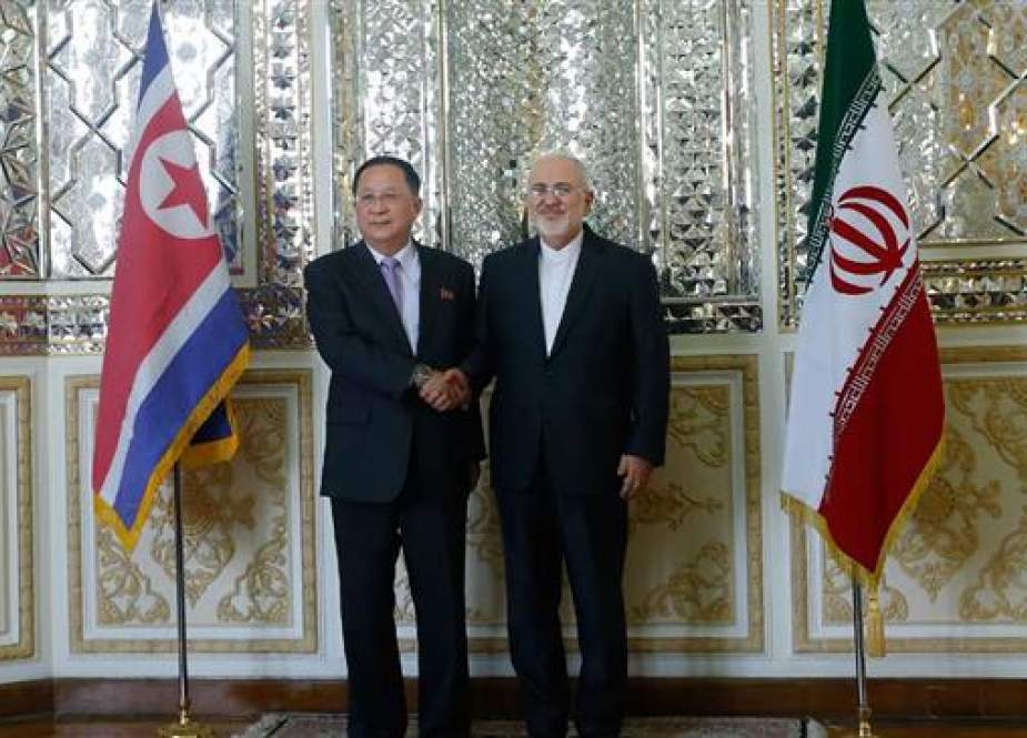 Iran’s Foreign Minister Mohammad Javad Zarif (R) and his North Korean counterpart, Ri Yong-ho, meet in Tehran, August 7, 2018.