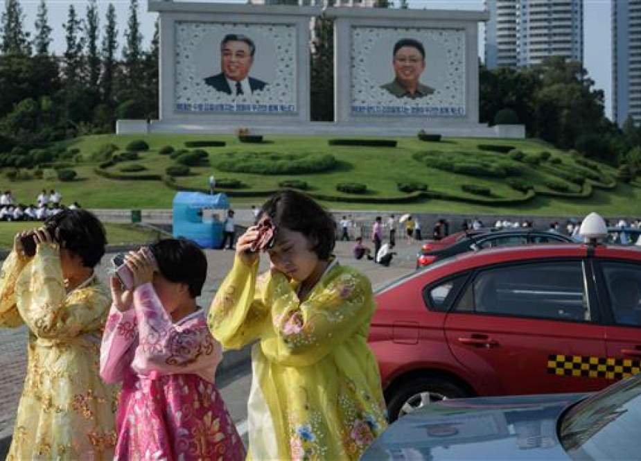 Women wearing traditional dress in Pyongyang, North Korea,.jpg