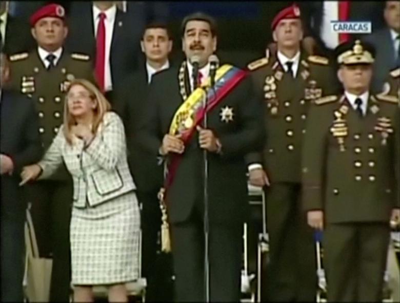 Venezuelan President Nicolas Maduro reacts during an event which was interrupted, in this still frame taken from video August 4, 2018, Caracas, Venezuela. Venezuelan authorities said on Sunday they detained six people over drone explosions the day before