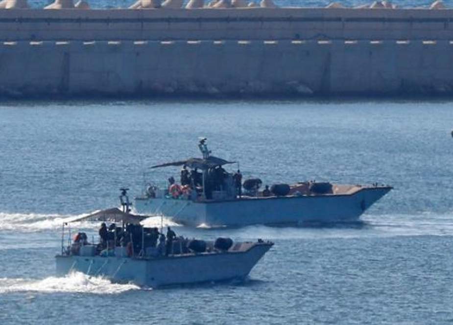 Israeli navy boats maneuver at the military port of Ashdod, in the southern part of the occupied Palestinian territories on July 29, 2018. (Photo by AFP)