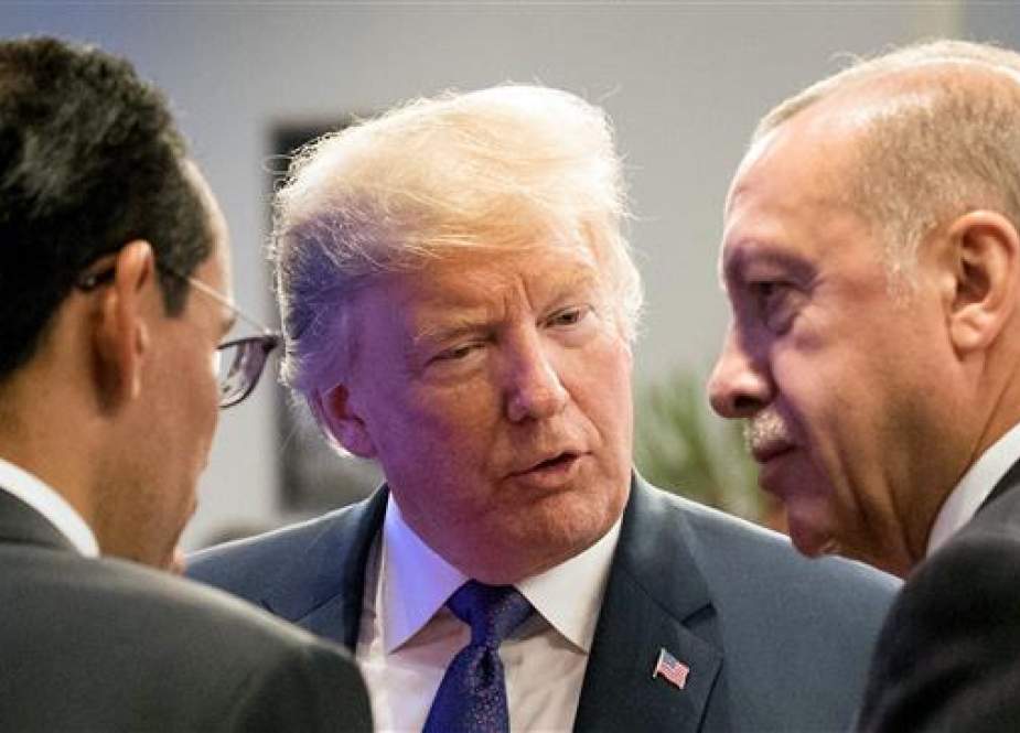 In this file photo taken on July 10, 2018 US President Donald Trump (2ndR) speaks with Turkey