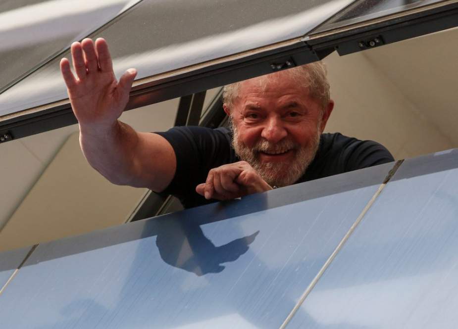 In this file photo taken on April 07, 2018, Brazilian ex-president Luiz Inacio Lula da Silva is seen as he waves to his supporters in metropolitan Sao Paulo, Brazil. (Photo by AFP)