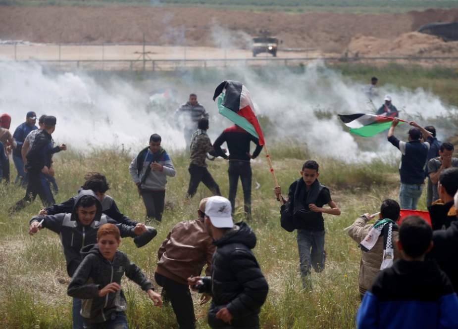 Palestinian protesters during The Great March of Retrun at Gaza border