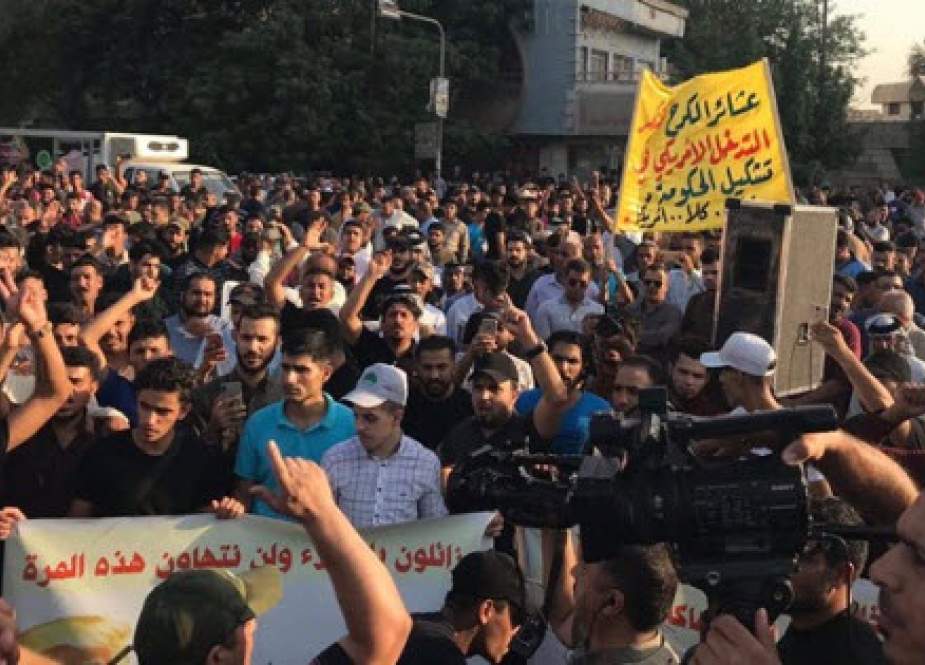 تظاهرات کنندگان عراقی: سفارت آمریکا در بغداد منبع تروریسم است + تصاویر