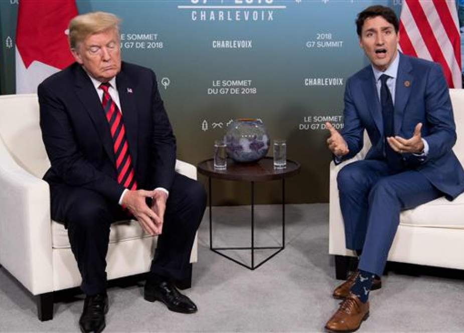 In this file photo taken on June 08, 2018, US President Donald Trump (L) and Canadian Prime Minister Justin Trudeau hold a meeting on the sidelines of the G7 Summit in La Malbaie, Quebec, Canada. (Photo by AFP)