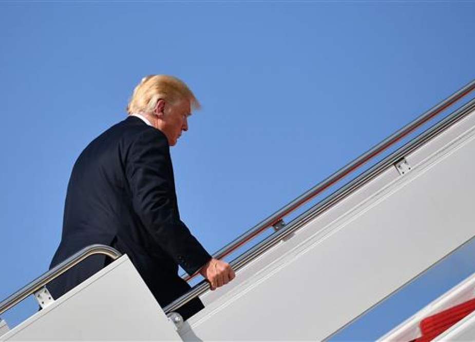 US President Donald Trump boards Air Force One at Andrews Air Force Base in Maryland on August 30, 2018. (Photo by AFP)