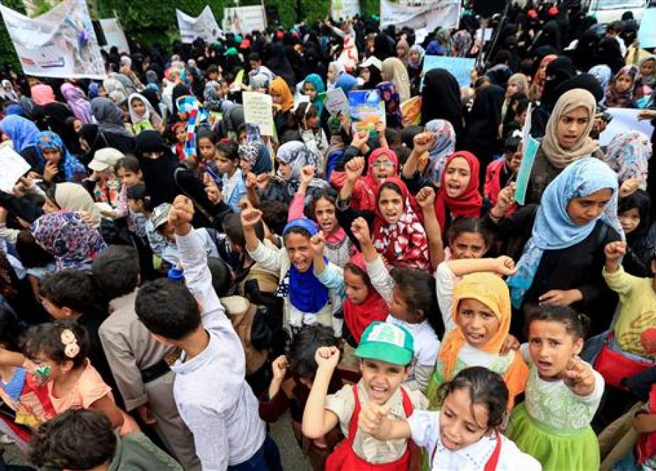 Yemeni children protest against a Saudi airstrike in the capital, Sana