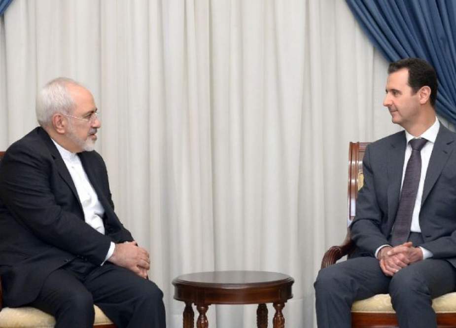 Syrian President Bashar al-Assad (R) and Iranian Foreign Minister Mohammad Javad Zarif meet in Damascus on September 3, 2018. (Photo by SANA)