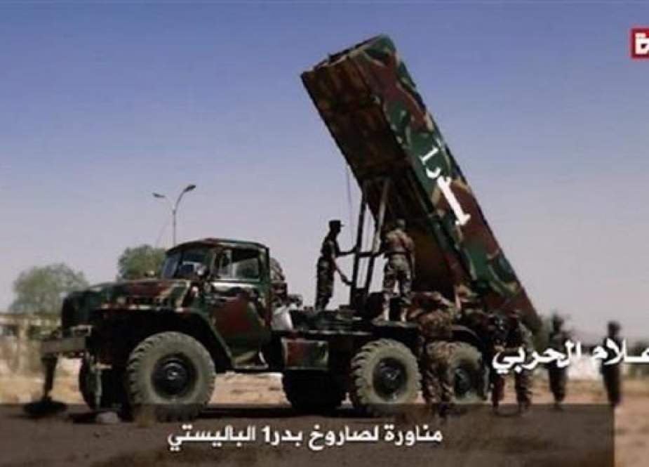 In this file picture, Yemeni forces prepare to launch a domestically-manufactured Badr-1 ballistic missile at a military site in Saudi Arabia. (Photo by Yemen’s Operations Command)