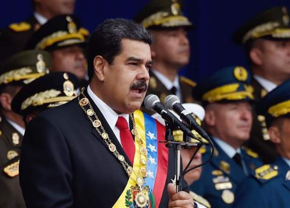 In this file photo taken on August 4, 2018, Venezuelan President Nicolas Maduro delivers a speech during a ceremony to celebrate the 81st anniversary of the National Guard in Caracas. (Photo by AFP)