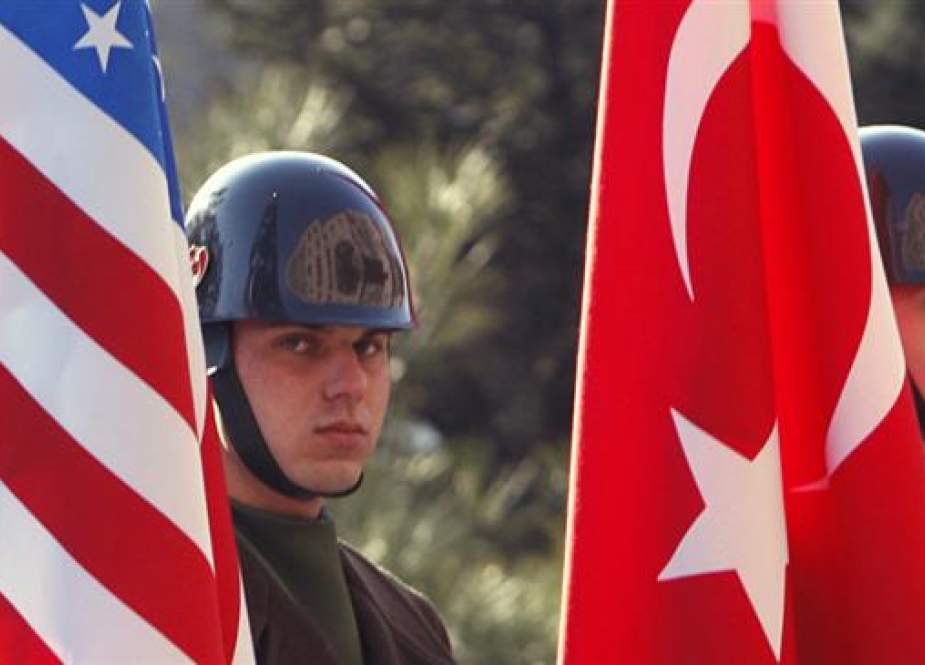 Turkish guards of honor stand with US and Turkish flags.jpg