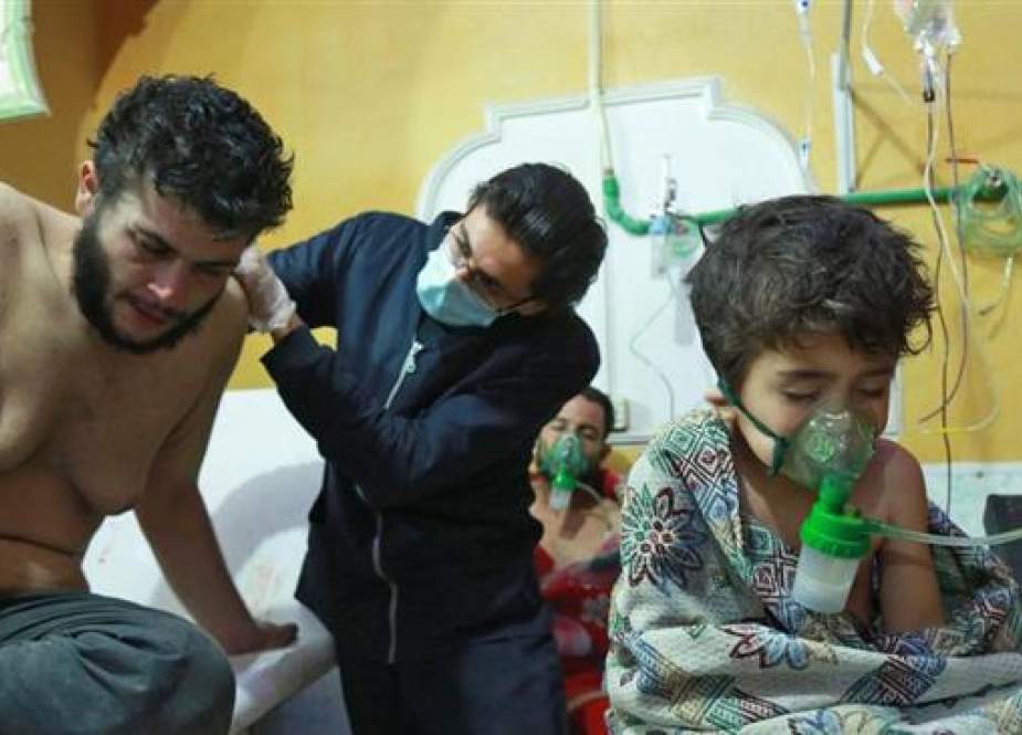 Syrian children and adults receive treatment for a 