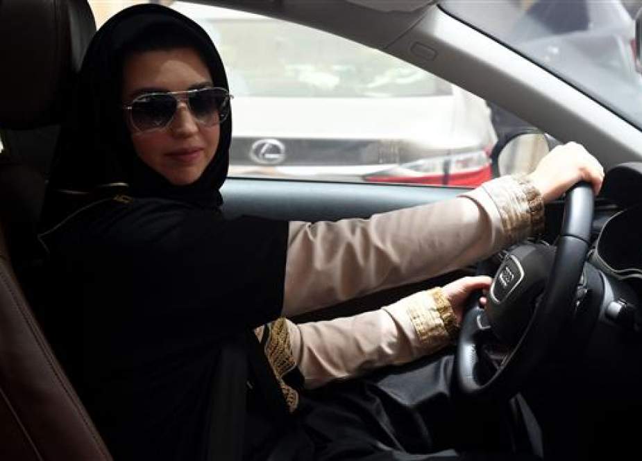 Daniah al-Ghalbi, a newly-licensed Saudi woman driver, sits in her car during a test-drive in the Red Sea resort of Jeddah on June 23, 2018, a day before the lifting of a ban on women driving in the conservative Arab kingdom. (Photo by AFP)