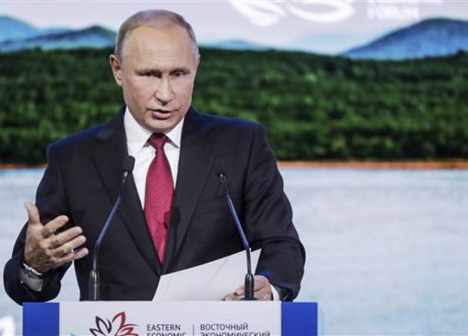 Russian President Vladimir Putin gestures as he addresses the Eastern Economic Forum, in Vladivostok, Russia, on September 12, 2018. (Photo by AP)
