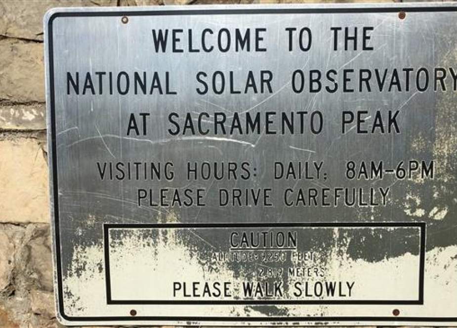 A sign at the entrance to the National Solar Observatory in Sunspot, N.M. The facility has been closed since it was evacuated on September 6. (Photo via The Washington Post)