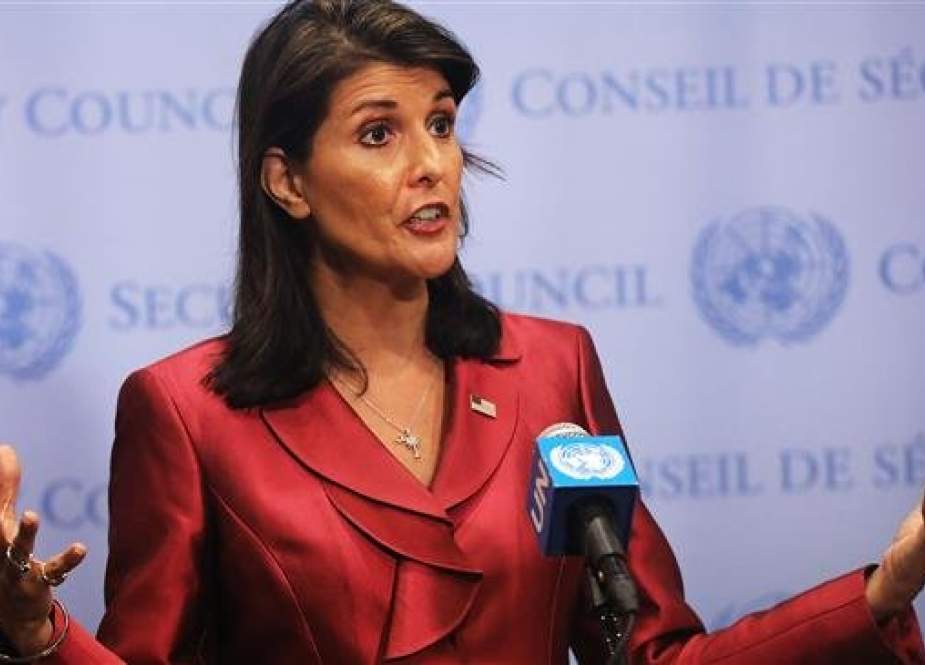 (FILES) In this file photo taken on September 20, 2018 United Nations (UN) Ambassador Nikki Haley speaks to the media ahead of the start of next week