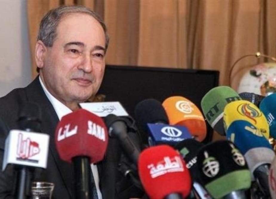 Syrian Deputy Foreign Minister Faisal Mekdad delivering a press conference in the capital Damascus.jpg