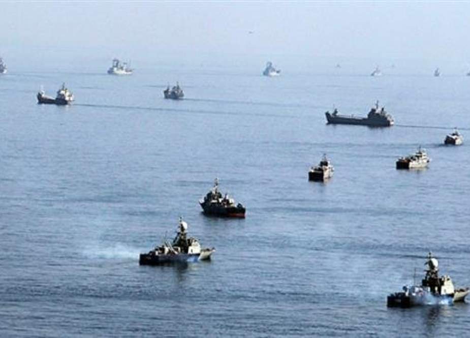 Iranian ships participate in a naval parade on the last day of the Velayat-90 war game on the Sea of Oman near the Strait of Hormuz on January 3, 2012. (Reuters file photo)