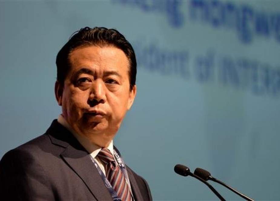 Picture taken on July 4, 2017 shows Meng Hongwei, president of Interpol, giving an addresses at the opening of the Interpol World Congress in Singapore. (Photo by AFP)