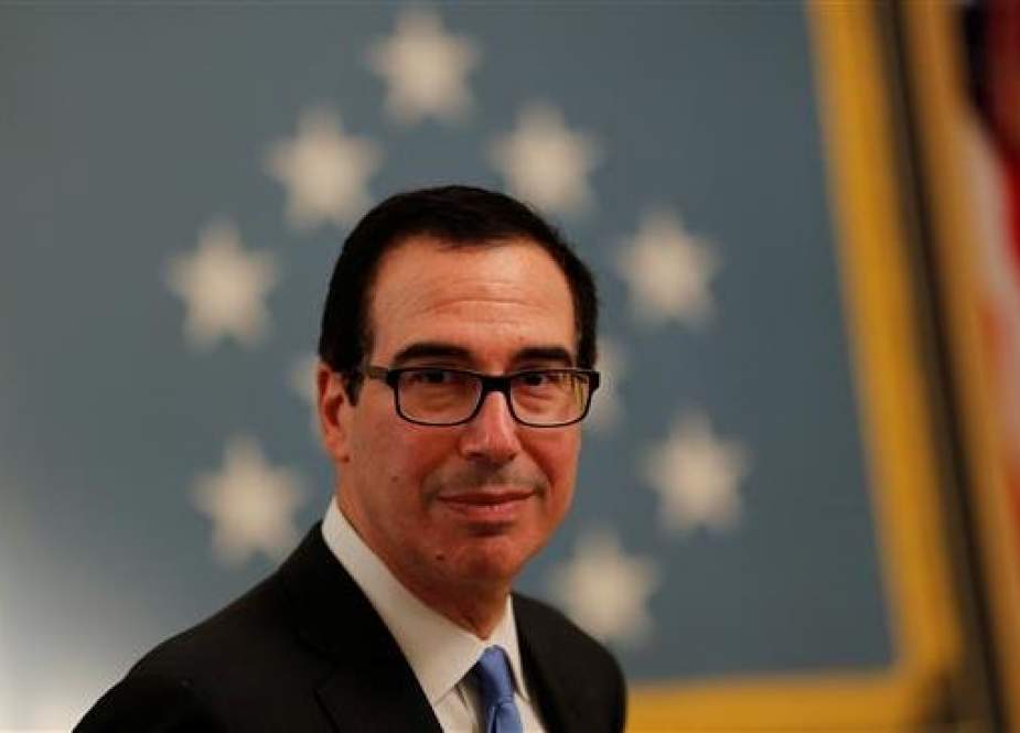 The file photo shows US Treasury Secretary Steven Mnuchin at a White House reception for Congressional Medal of Honor recipients in the East Room of the White in Washington, DC, September 12, 2018. (Photo by Reuters)