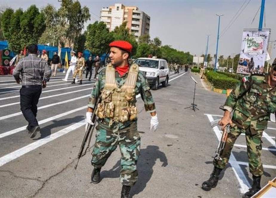 Soldiers are seen at the scene of an attack on a military parade in the southwestern Iranian city of Ahvaz on September 22, 2018. (Photo by ISNA)