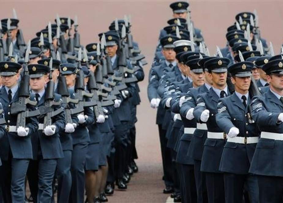 Royal Air Force personnel parade on the Mall toward Buckingham Palace in London on July 10, 2018 during celebrations to mark its centenary. (Photo by AFP)