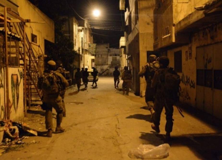 Israeli Occupation Forces during a night raid in West Bank town