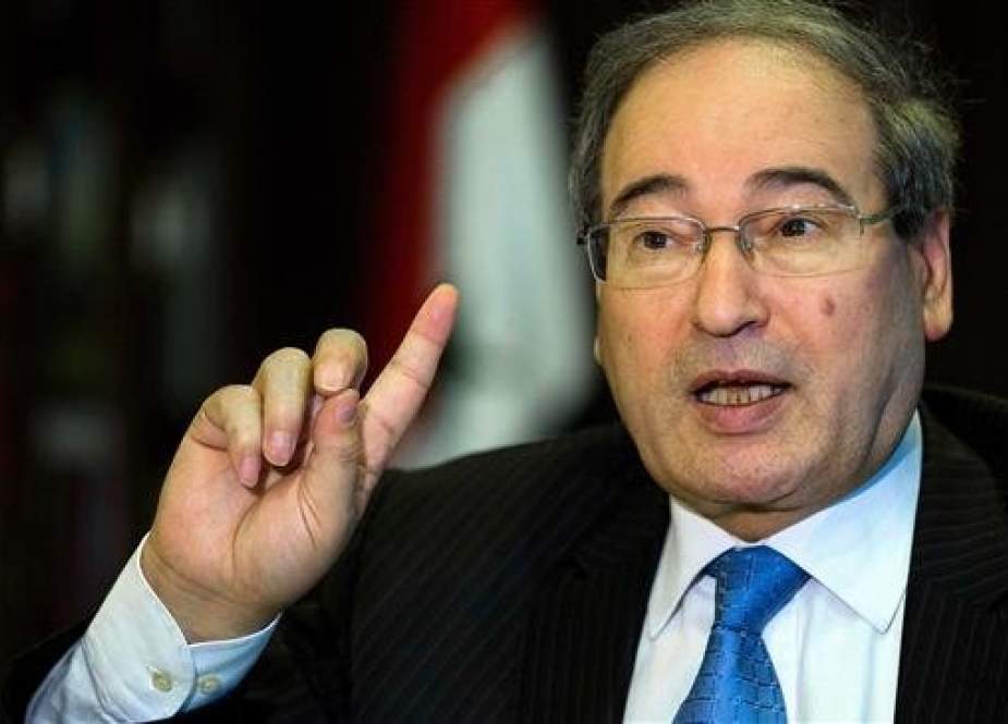 Syrian Deputy Foreign Minister Faisal Mekdad speaks during an interview with The Associated Press at his office in Damascus, Syria. (File photo)