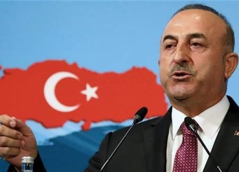 Turkish Foreign Minister Mevlut Cavusoglu speaks during the 10th Ambassadors