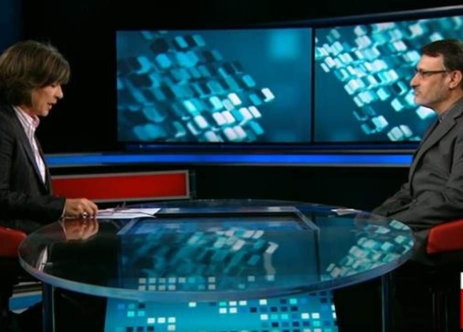 Frame grab from an interview with Iran’s UK Ambassador Hamid Baeidinejad (R) by CNN’s Christian Amanpour