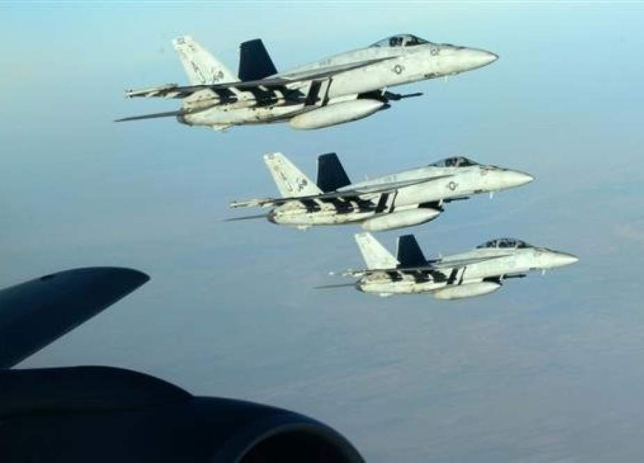 In this file picture released by the US Air Force, a formation of US Navy F-18E Super Hornets leaves after receiving fuel from a KC-135 Stratotanker over northern Iraq as part of US-led coalition airstrikes on purported Daesh targets in Syria. (Photo by the Associated Press)