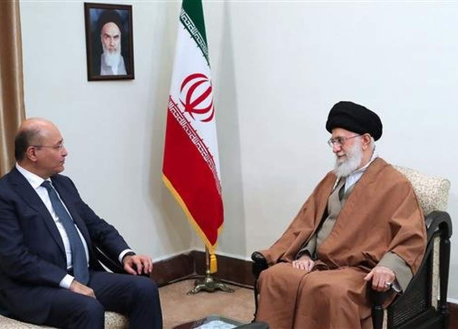 Leader of the Islamic Revolution Ayatollah Seyyed Ali Khamenei (R) and Iraqi President Barham Salih meet in Tehran on November 17, 2018. (Photo by khamenei.ir)