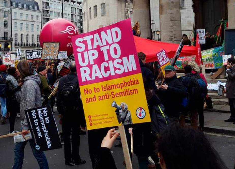 Hundreds of demonstrators gather outside the BBC headquarters in London, Britain, to protest racism and fascism, on November 17, 2018.