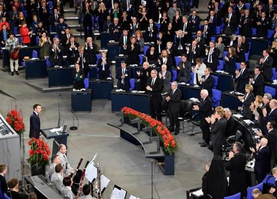 French President Emmanuel Macron is applauded after speaking before the German parliament.jpg