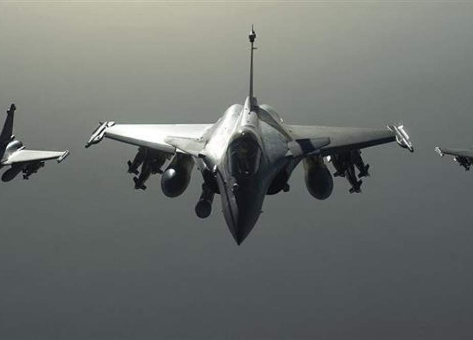 This picture released by the French Army Communications Audiovisual office shows French army Rafale fighter jets flying towards Syria. (Photo by the Associated Press)