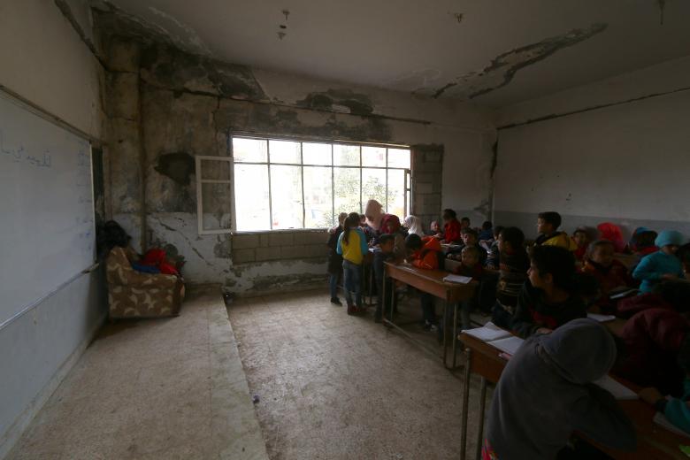 School children sit in a classroom at a school in Raqqa, Syria November 7, 2018.