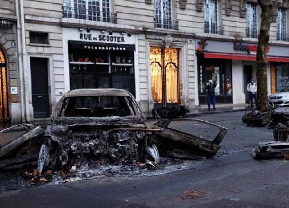 Vehicles in the streets of Paris were torched and some 400 arrests were made during the 