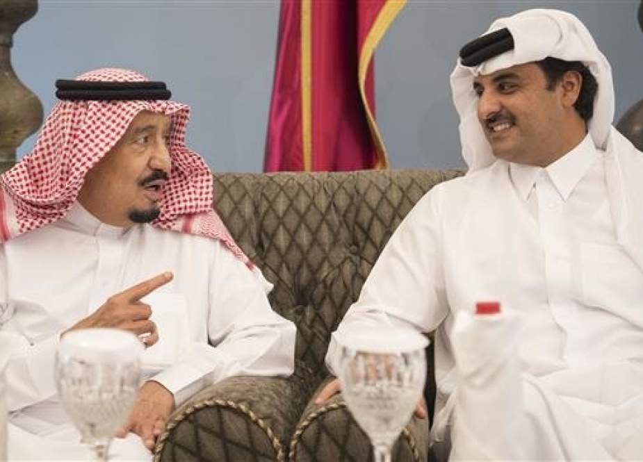 A handout picture provided by the Saudi Royal Palace on December 6, 2016 shows Saudi King Salman (L) chatting with Emir of Qatar Sheikh Tamim bin Hamad Al Thani in Doha before heading to Bahrain to attend a [Persian] Gulf Cooperation Council ([P]GCC) summit. (Photo by AFP)