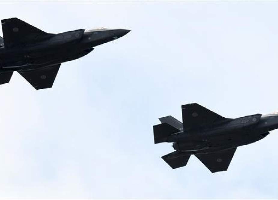 This AFP file photo taken on October 14, 2018, shows two F-35 fighter aircraft from the Japan’s Air Self-Defense Force take part in a military exercise.