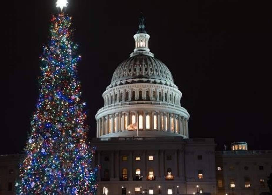 The US Capitol Christmas Tree, a Noble Fir from Oregon, is seen following a lighting ceremony on Capitol Hill in Washington, DC, December 6, 2018. (Photo by AFP)
