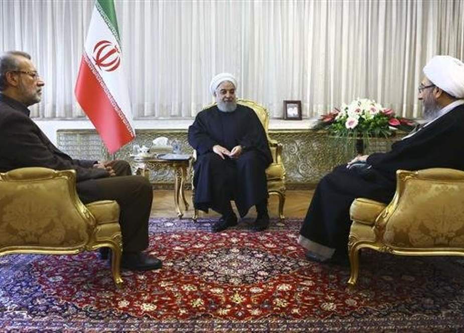 Iranian President Hassan Rouhani (C) meets with heads of the Iranian Parliament and Judiciary, Ali Larijani (L) and Ayatollah Sadeq Amoli Larijani