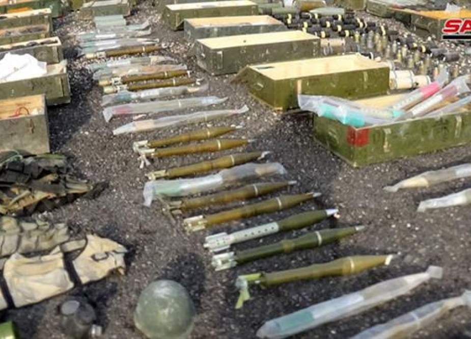 This picture taken on December 11, 2018, shows weapons seized by Syrian government forces during a military operation against Takfiri terrorists in the village of Nasib. (Photo by SANA)