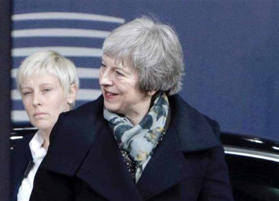British Prime minister Theresa May arrives for a meeting with the EU commission chief as part of the Brexit negotiations, December 11, 2018, in Brussels. (Photo by AFP)