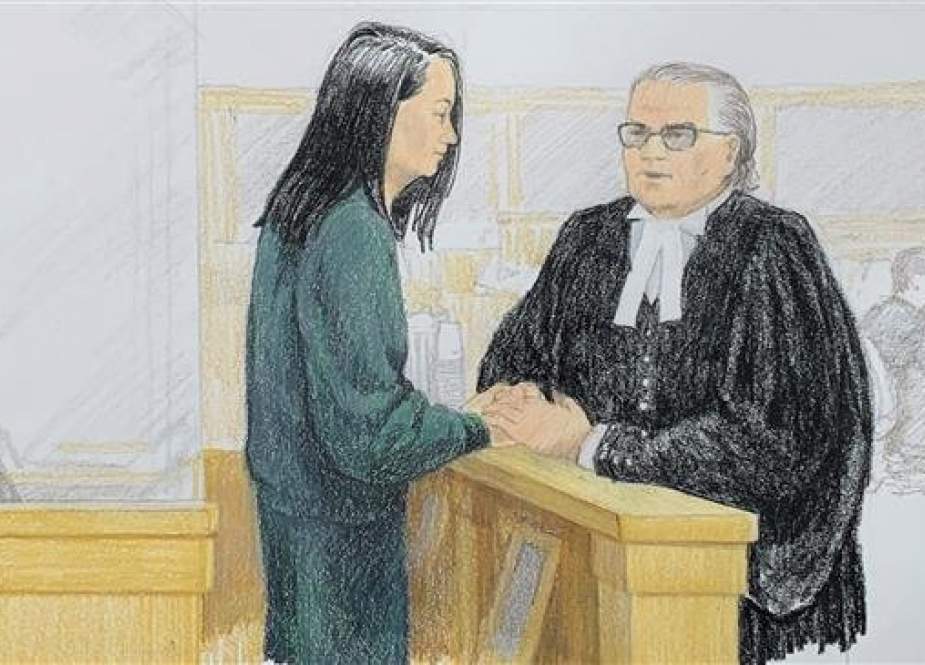 In this courtroom sketch, Meng Wanzhou (L) is drawn speaking with lawyer David Martin in a courtroom in Vancouver, British Columbia, Canada, on December 10, 2018. (Photo by AFP)