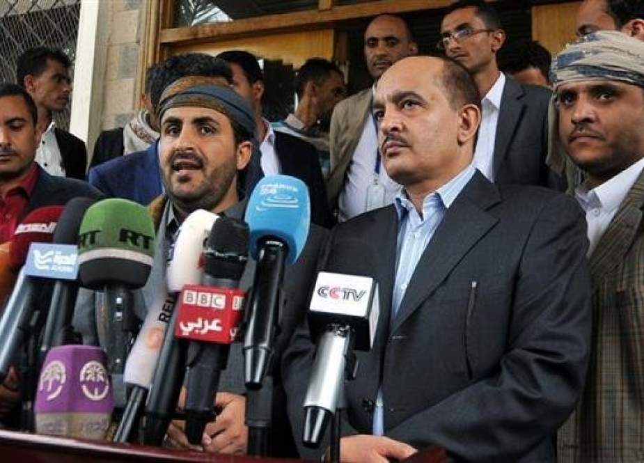 Houthi spokesman Mohammed Abdulsalam (2nd L, front) speaks during a press conference at the Sana