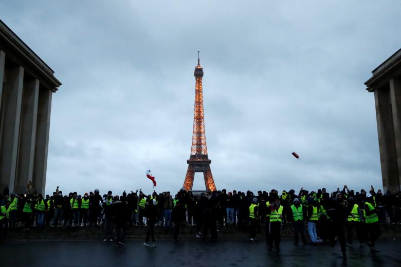 Protesters wearing yellow vests gather at Trocadero place in front of the Eiffel Tower as part of a national day of protest by the 