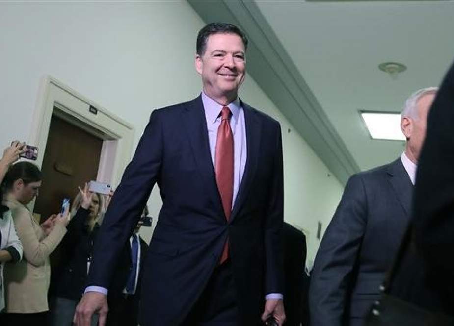 Former FBI Director James Comey arrives at the Rayburn House Office Building before testifying to the House Judiciary and Oversight and Government Reform committees on Capitol Hill December 17, 2018 in Washington, DC. (AFP photo)