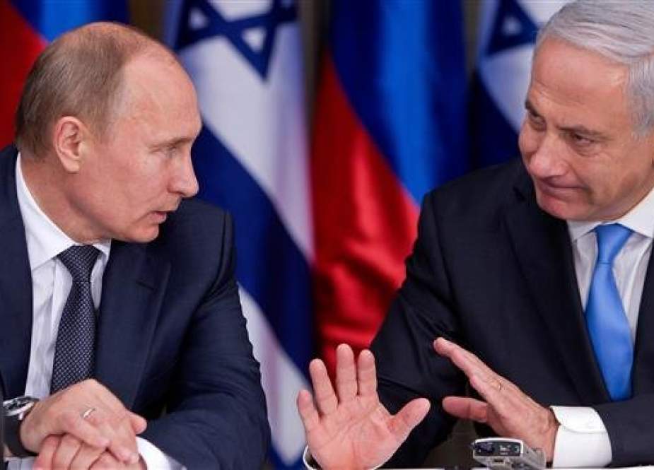 Russian President Vladimir Putin (L) and Israeli Prime Minister Benjamin Netanyahu